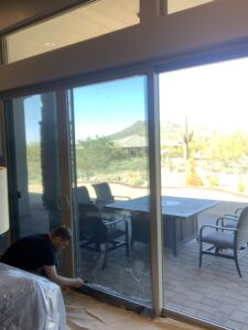 my son finishing up a large glass pane using SunTek UVLDS 50%